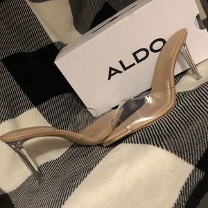 A clear, nude, and gold heel size 11. Have been worn once come from Aldo
